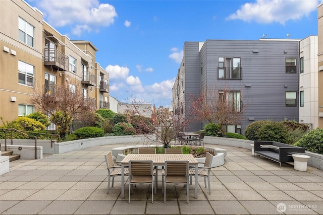 413 NE 70th St Unit 402, Seattle, WA 98115 - view of patio / terrace featuring outdoor dining area