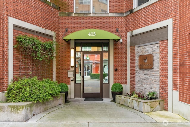 413 NE 70th St Unit 402, Seattle, WA 98115 - entrance to property featuring brick siding
