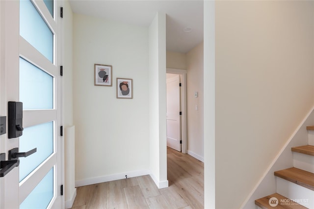 3111 Queen Anne Ave N, Seattle, WA 98119 - interior space with light wood-style floors, baseboards, and stairway