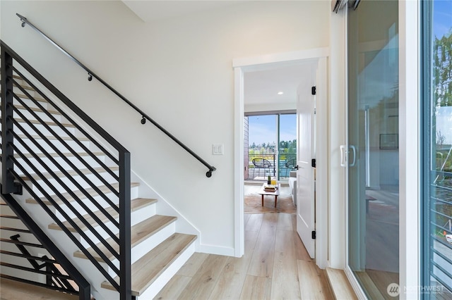 3111 Queen Anne Ave N, Seattle, WA 98119 - stairs featuring wood finished floors and baseboards