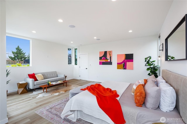 3111 Queen Anne Ave N, Seattle, WA 98119 - bedroom with light wood-style floors, baseboards, and recessed lighting