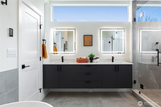 3111 Queen Anne Ave N, Seattle, WA 98119 - full bath with a sink, a stall shower, and a healthy amount of sunlight