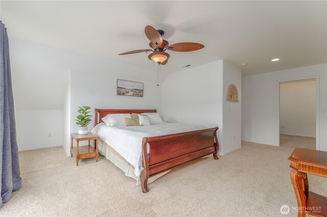 carpeted bedroom featuring a ceiling fan, visible vents, recessed lighting, lofted ceiling, and baseboards
