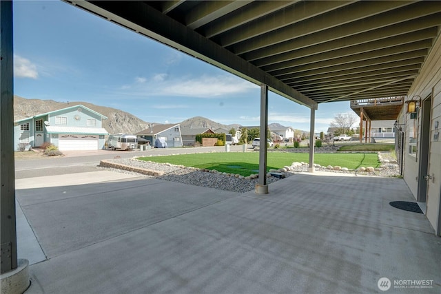 view of patio / terrace featuring a mountain view