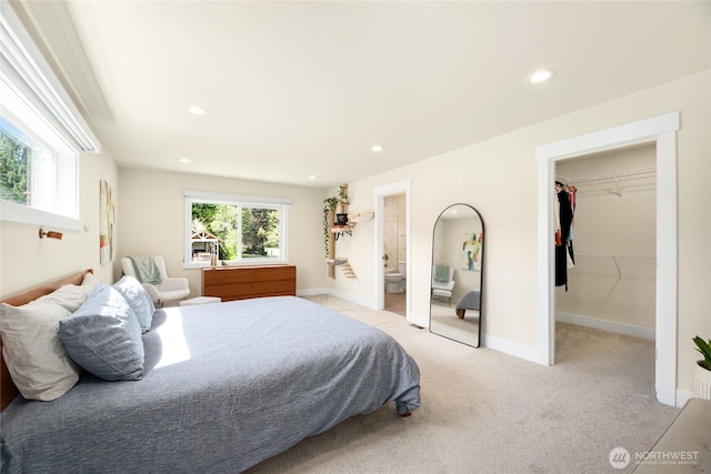 10410 2nd Pl SW, Seattle, WA 98146 - bedroom with recessed lighting, light colored carpet, a spacious closet, and baseboards