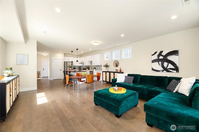 10410 2nd Pl SW, Seattle, WA 98146 - living area with baseboards, recessed lighting, wood finished floors, and visible vents