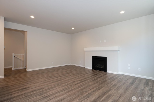 27105 30th Pl S Unit 21, Kent, WA 98032 - unfurnished living room with wood finished floors, a fireplace, baseboards, and recessed lighting