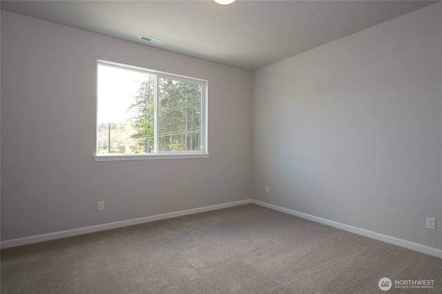 27105 30th Pl S Unit 21, Kent, WA 98032 - spare room with visible vents, baseboards, and carpet