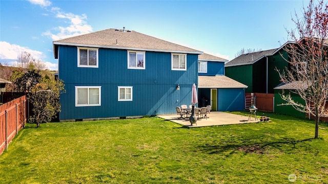 2335 Hawk Dr, Walla Walla, WA 99362 - rear view of property with a patio area, a fenced backyard, and a lawn