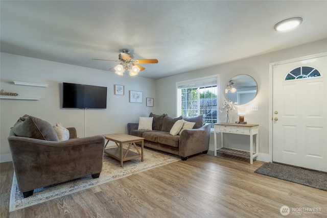 2335 Hawk Dr, Walla Walla, WA 99362 - living area with baseboards, a ceiling fan, and wood finished floors