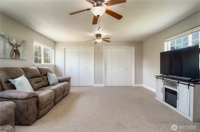 2335 Hawk Dr, Walla Walla, WA 99362 - carpeted living room with baseboards and a ceiling fan