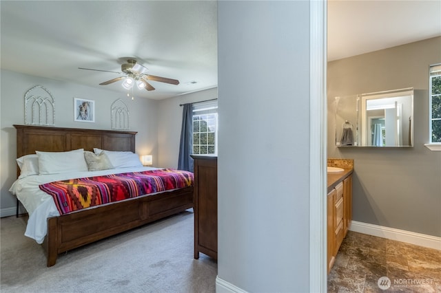 2335 Hawk Dr, Walla Walla, WA 99362 - bedroom featuring visible vents, baseboards, a ceiling fan, and ensuite bath