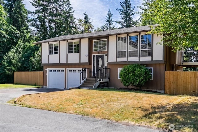 515 N 188th St, Shoreline, WA 98133 - raised ranch with concrete driveway and a garage