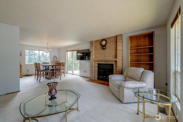 515 N 188th St, Shoreline, WA 98133 - living room with carpet floors, a fireplace, and a chandelier