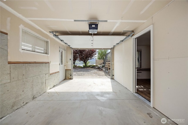 garage featuring a garage door opener