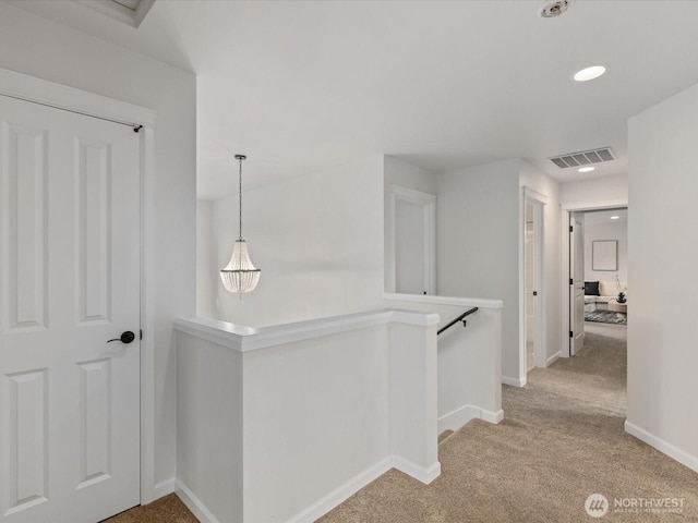 5258 S 285th St, Auburn, WA 98001 - corridor featuring visible vents, an upstairs landing, and carpet