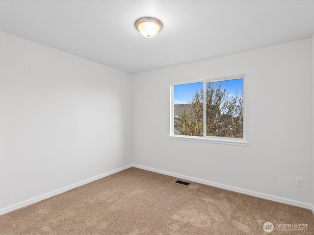 5258 S 285th St, Auburn, WA 98001 - carpeted spare room with visible vents and baseboards