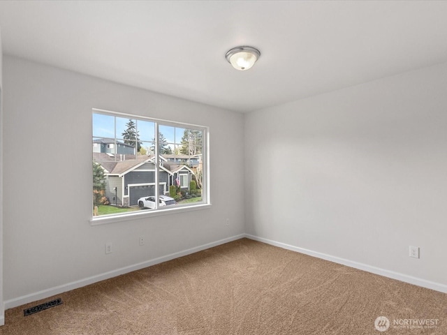 5258 S 285th St, Auburn, WA 98001 - carpeted spare room featuring visible vents and baseboards