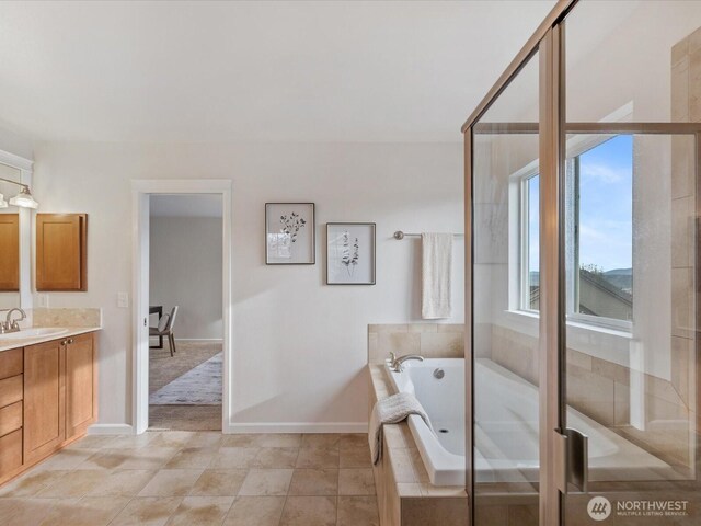 5258 S 285th St, Auburn, WA 98001 - full bath with a garden tub, vanity, and baseboards