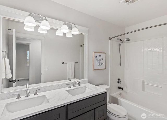 5258 S 285th St, Auburn, WA 98001 - full bathroom with a sink, toilet, double vanity, and shower / washtub combination