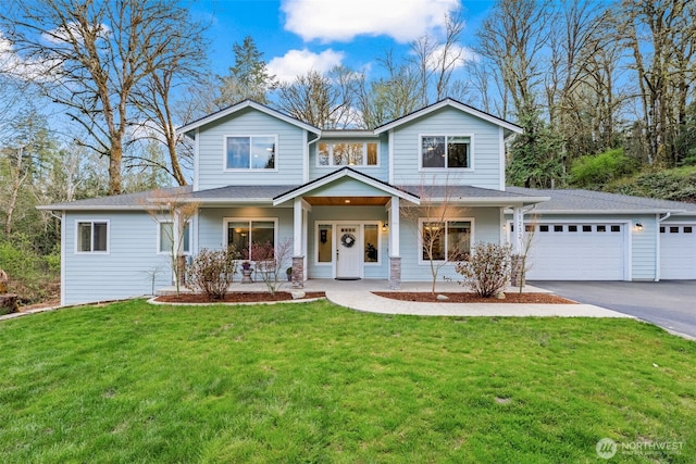 11232 Crescent Valley Dr NW, Gig Harbor, WA 98332 - view of front of property featuring covered porch, aphalt driveway, an attached garage, and a front yard