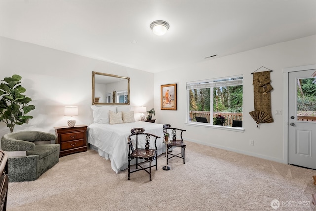 11232 Crescent Valley Dr NW, Gig Harbor, WA 98332 - bedroom featuring visible vents, baseboards, and light carpet