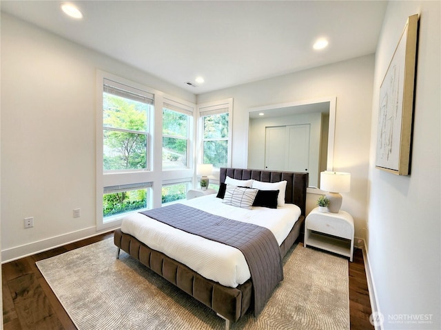 bedroom with recessed lighting, visible vents, and multiple windows