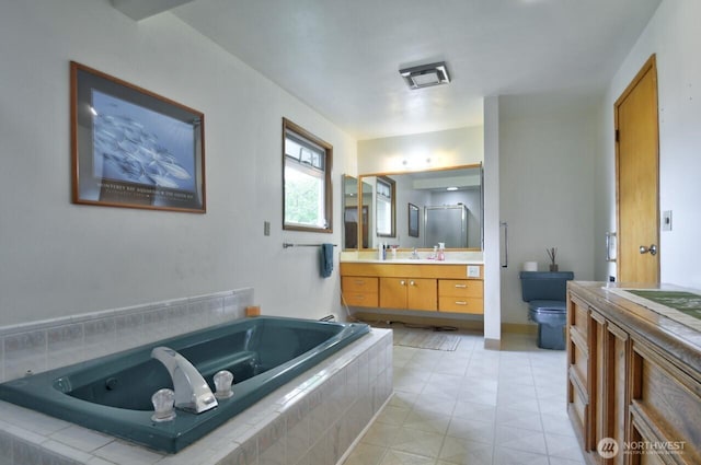 11202 Littlerock Rd SW, Olympia, WA 98512 - full bath featuring vanity, toilet, a tub with jets, and an enclosed shower