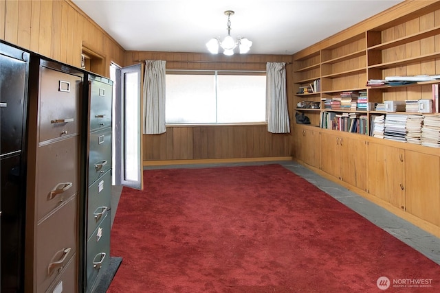 115 Kakela Rd, Winlock, WA 98596 - interior space with wood walls, dark carpet, and a chandelier