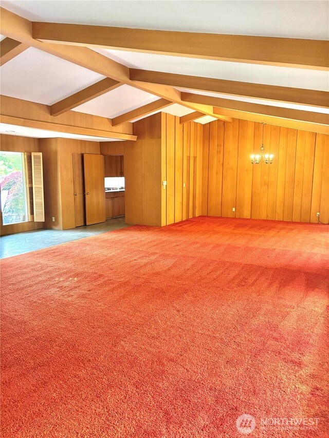115 Kakela Rd, Winlock, WA 98596 - unfurnished room with wood walls and a chandelier