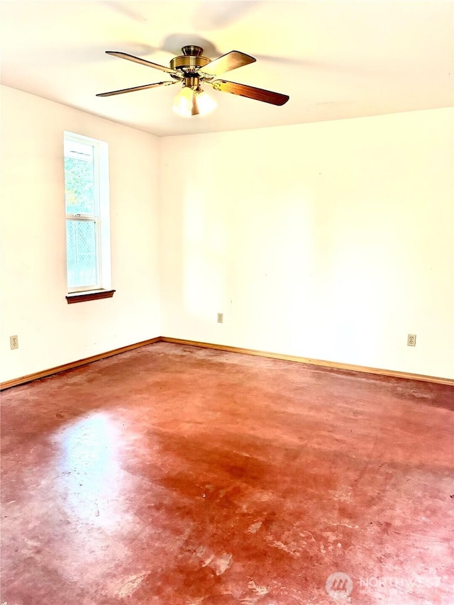 115 Kakela Rd, Winlock, WA 98596 - spare room with finished concrete flooring, ceiling fan, and baseboards