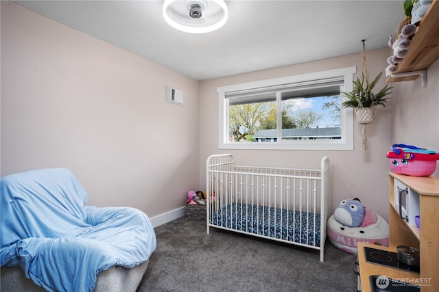 carpeted bedroom with visible vents and baseboards