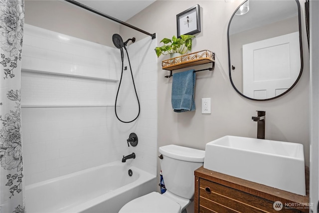 full bathroom with shower / bath combo with shower curtain, vanity, and toilet