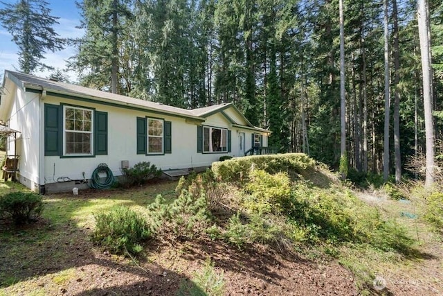 11712 114th Avenue Ct, Anderson Island, WA 98303 - view of side of home featuring crawl space