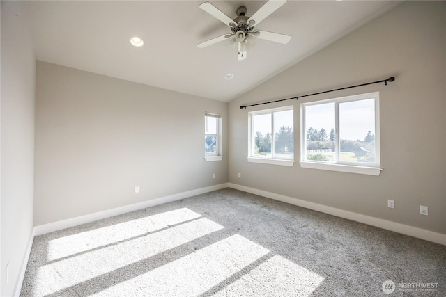 spare room with baseboards, recessed lighting, a ceiling fan, lofted ceiling, and light colored carpet