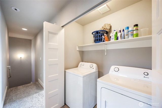 laundry area featuring visible vents, washer and dryer, laundry area, recessed lighting, and light colored carpet