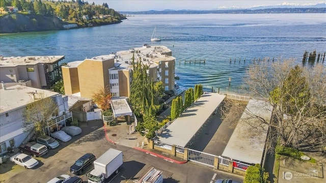 birds eye view of property featuring a water view