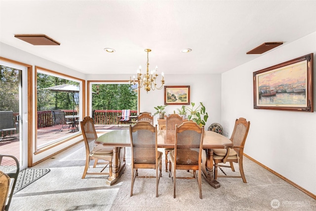 9652 Ronald Dr, Blaine, WA 98230 - dining room with recessed lighting, baseboards, light colored carpet, and an inviting chandelier