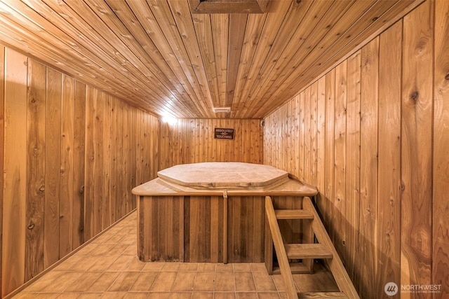 9652 Ronald Dr, Blaine, WA 98230 - interior space featuring wooden walls, wooden ceiling, light tile patterned floors, and a sauna