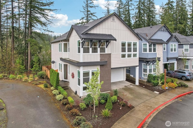 1332 247th Pl NE, Sammamish, WA 98074 - view of front of house with an attached garage, board and batten siding, and concrete driveway