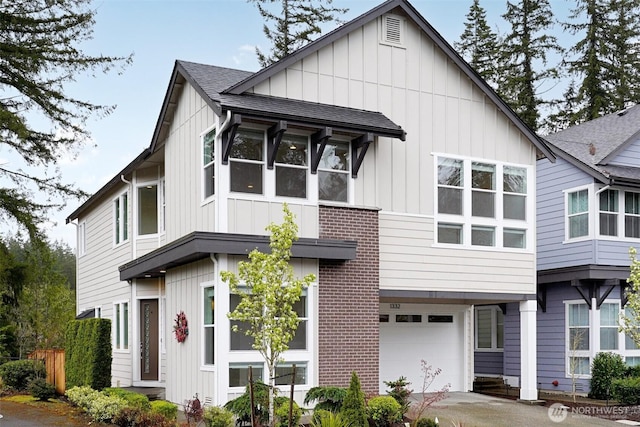 1332 247th Pl NE, Sammamish, WA 98074 - view of front of house with a shingled roof, board and batten siding, and a garage