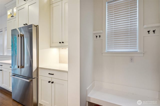 1332 247th Pl NE, Sammamish, WA 98074 - kitchen featuring white cabinets, glass insert cabinets, light countertops, and high quality fridge