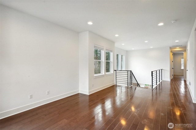 1332 247th Pl NE, Sammamish, WA 98074 - spare room featuring wood finished floors, baseboards, and recessed lighting