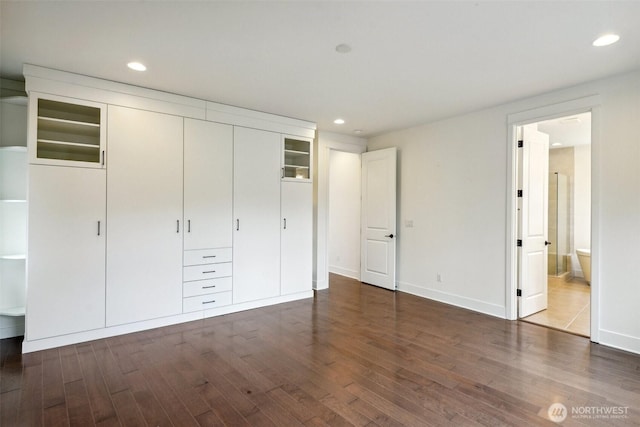 1332 247th Pl NE, Sammamish, WA 98074 - unfurnished bedroom featuring recessed lighting, a closet, baseboards, and dark wood finished floors