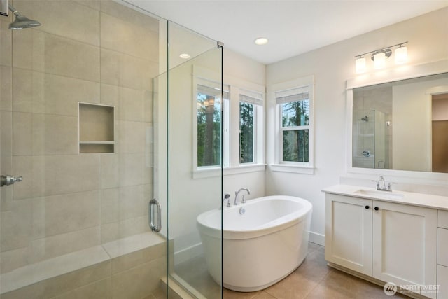 1332 247th Pl NE, Sammamish, WA 98074 - bathroom with a freestanding tub, vanity, recessed lighting, tile patterned floors, and a shower stall