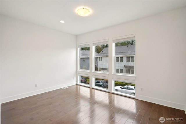 1332 247th Pl NE, Sammamish, WA 98074 - spare room featuring baseboards, dark wood finished floors, visible vents, and recessed lighting