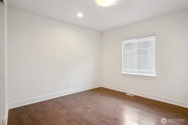 1332 247th Pl NE, Sammamish, WA 98074 - spare room featuring recessed lighting, dark wood-type flooring, visible vents, and baseboards