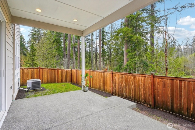 1332 247th Pl NE, Sammamish, WA 98074 - view of patio featuring central AC unit and a fenced backyard