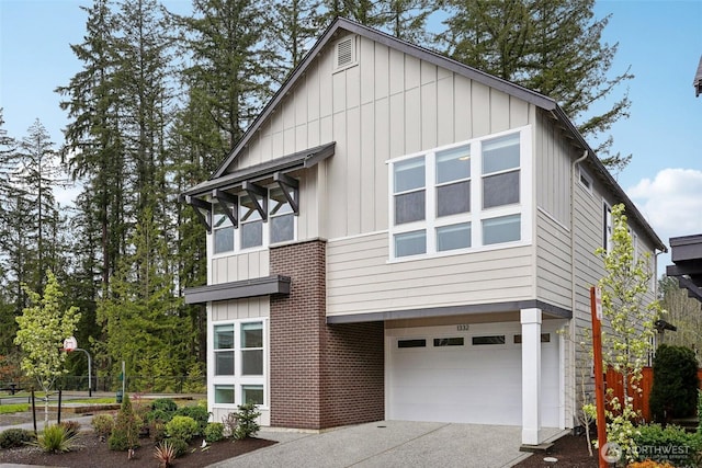 1332 247th Pl NE, Sammamish, WA 98074 - view of front facade featuring an attached garage, board and batten siding, concrete driveway, and brick siding