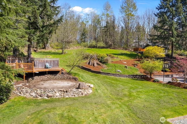 view of yard with a wooden deck